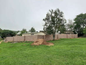 The village seen behind the new security wall.