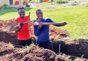 Our post school boys jump in to lend a hand!