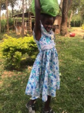 One of the children we support carrying supplies