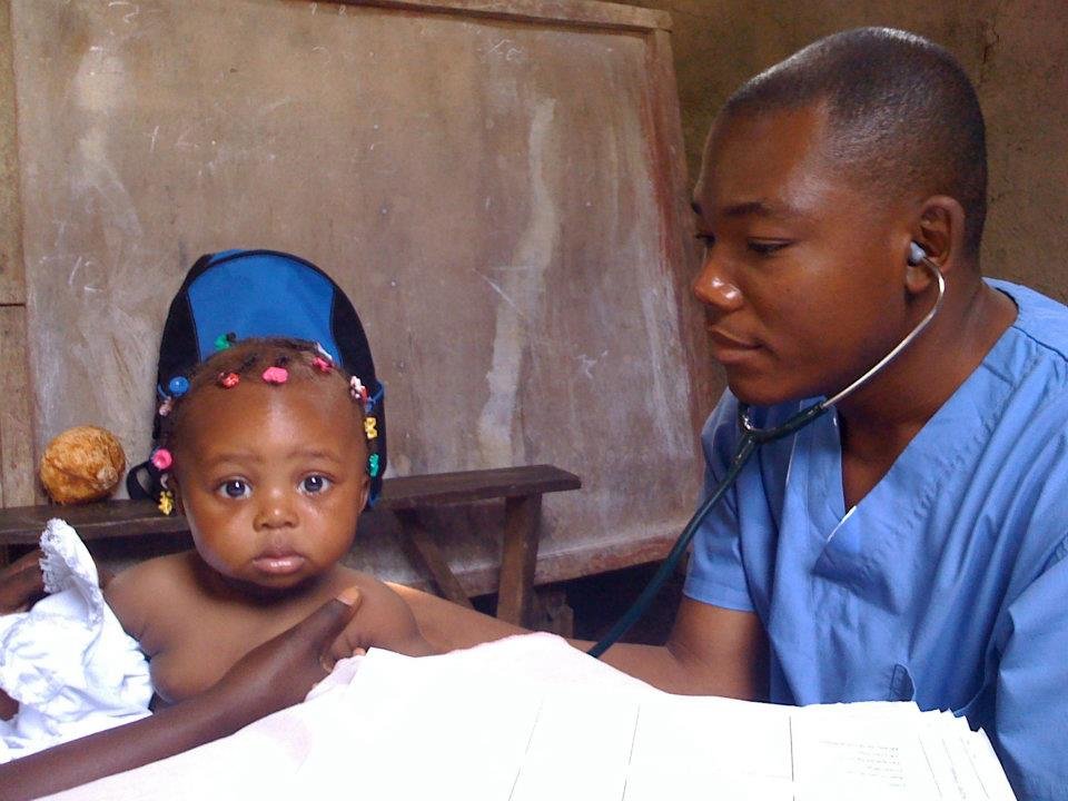 Doctor with young child