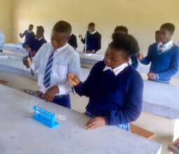 Science Lab Learners with Equipment