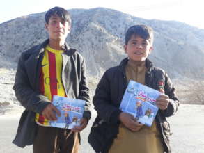 Children receiving the books, Panjshir province