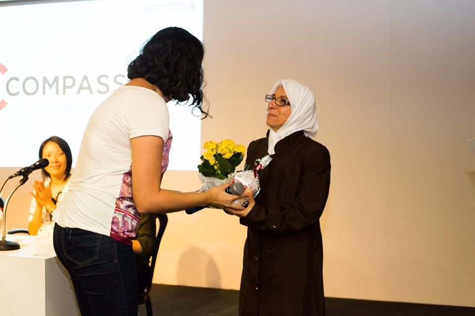 A student being awarded her certificate