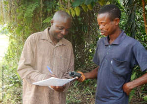 Albert Alukana (left), prepares for delimitation