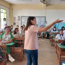 Aika teaching young people sex ed