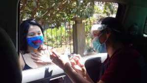 Nurse Daisy providing info on pills from our car