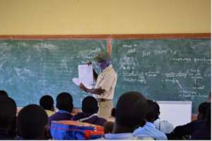 Mogomotsi teaching in Khumaga Primary School