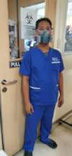 Benjie Balleros, Lab Aide wearing the respirator