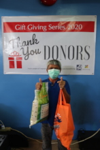 GG Patient model receiving his grocery and rice