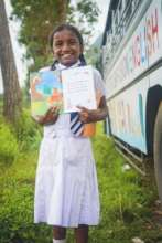 Student with our Mobile Library Bus