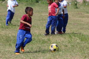 Playing soccer
