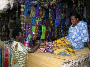Purchasing fabric in the Arua market