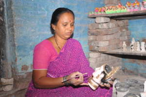Hand Painted Pottery design by young woman