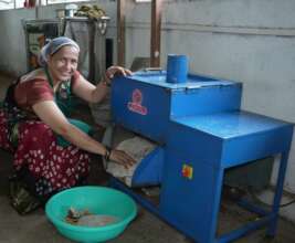 Sunita using machineries at her unit