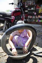 Uma Chavan Repairing Motor-bike