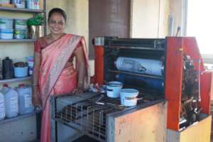 Vanita with her bag printing machinery