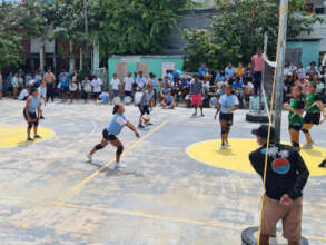 Girls Volleyball on the open air basketball court