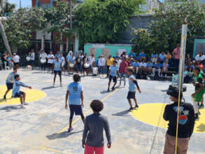 Boys Volleyball on the open air basketball court