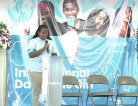 Diany speaks at the UNICEF Program