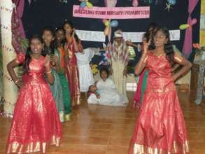 Children dance with baby