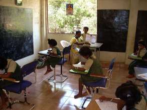 children writing exam