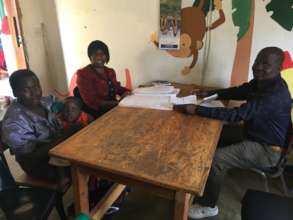 Clinical Officer assessing a client