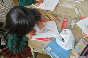 Children at Lake Tota, drawing the Apolinar's Wren