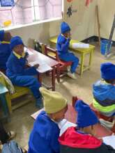 Working Hard on our Letters and Numbers