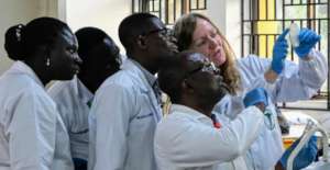 Prof. Martha Clokie teaching in the lab