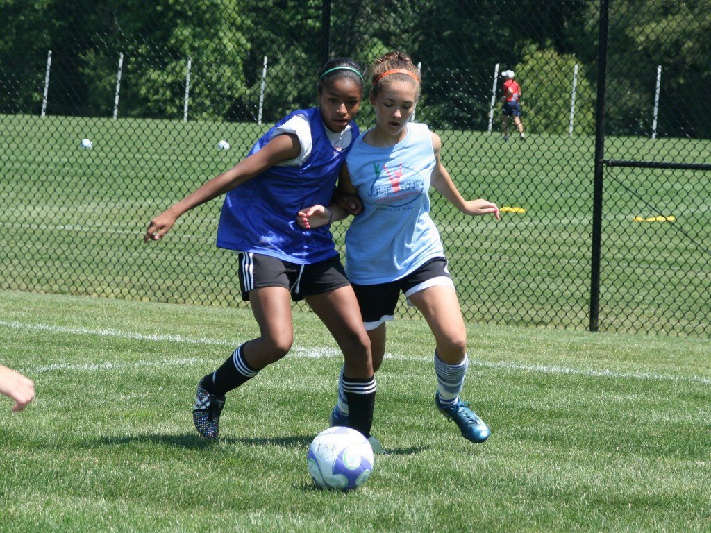 Academy students playing soccer