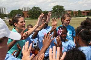 Julie Foudy and students on Community Service Day