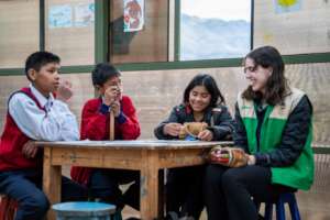 Peru children with staff