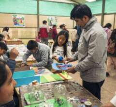 A father participating in the community fair