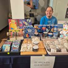 Ivan selling our workshop's products at a Bazar