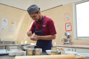 Fernando preparing the granola mix