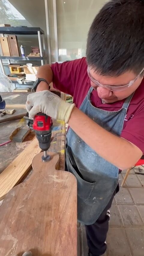 Juan Jose hard at work in the carpentry workshop