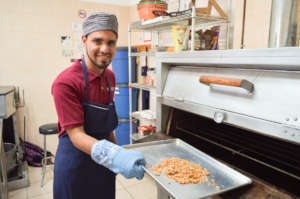 Fernando is baking granola