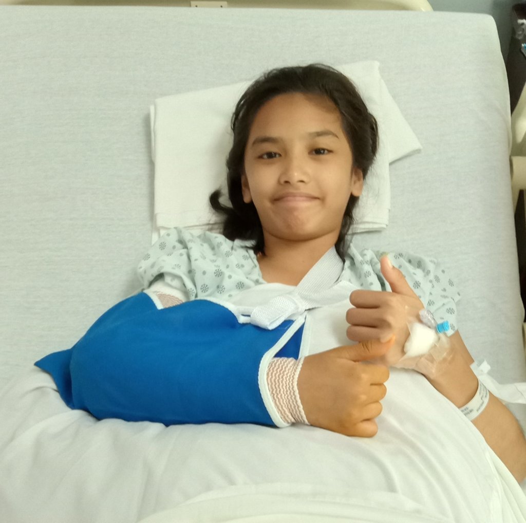 Jeslyn after elbow surgery