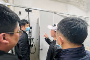 Inspecting new solar-heated shower rooms