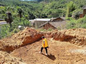 A Zhengxin team member inspects the progress