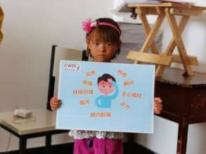 A younger student learns about common symptoms
