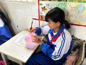 Writing plans to achieve her dreams
