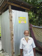 Poor male Using of the project Sanitary latrine