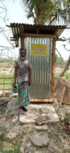 Old poor man using Sanitary Latrine