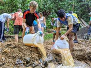 Students helped build an access bridge in Quepos