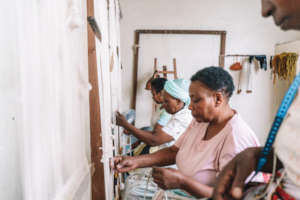 Imani women weaving