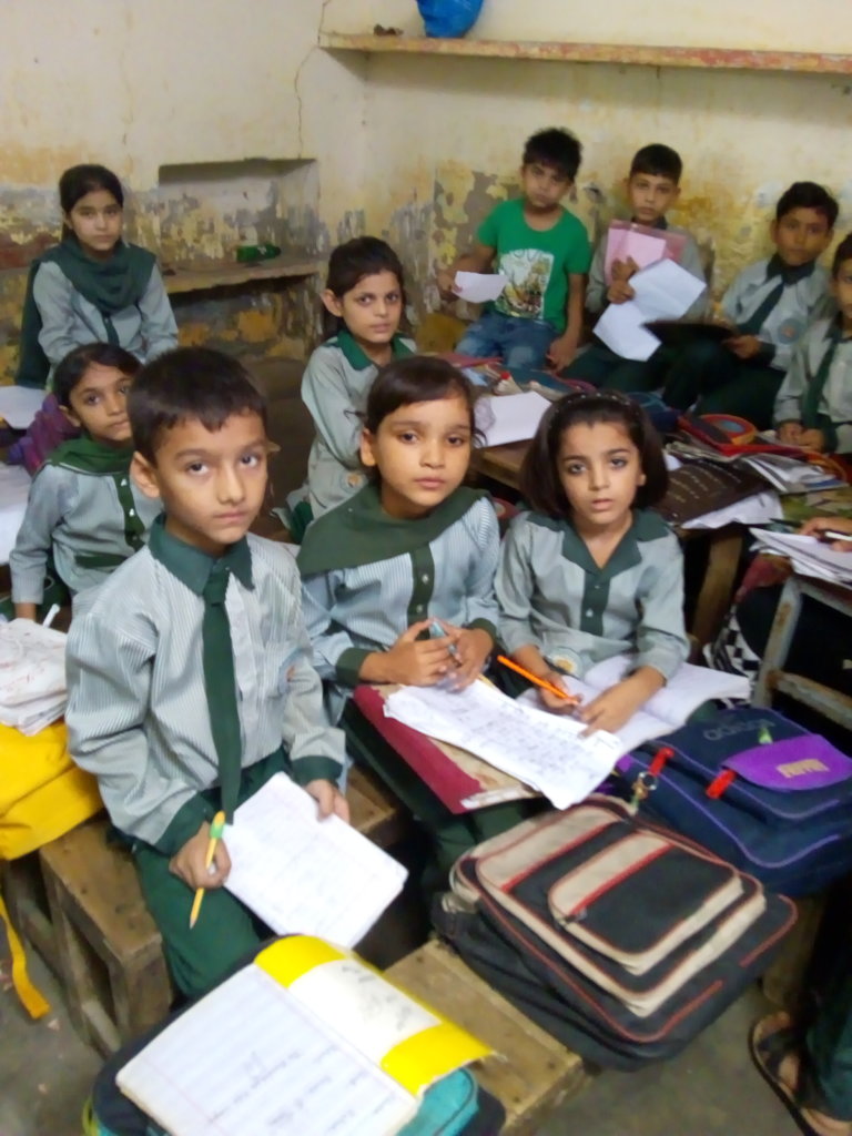 help renovate and paint community school Pakistan