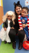 Teacher with students Halloween