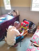 Fitting a child with cerebral palsy in a CP chair