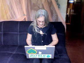 Roberta on the new futon with plenty of room